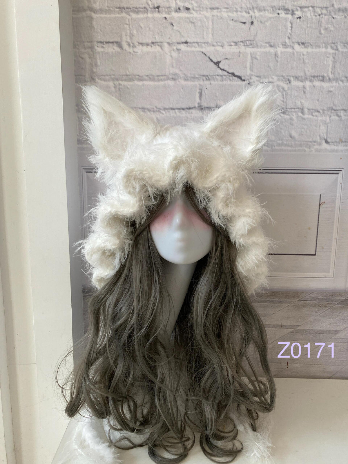 handmade crochet fairycore coquette fox ear hood in fluffy white texture with tall pointed ears and soft trailing ties. Whimsical winter headwear for cosplay, photoshoot prop and gift idea