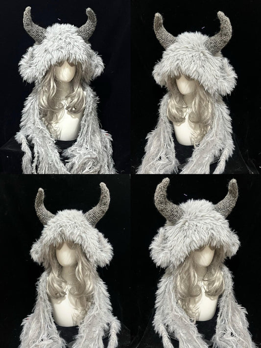 collection of handmade crochet dark fairycore goat horn hoods in gray and white shaggy texture with curved gray horns, fantasy festival headwear