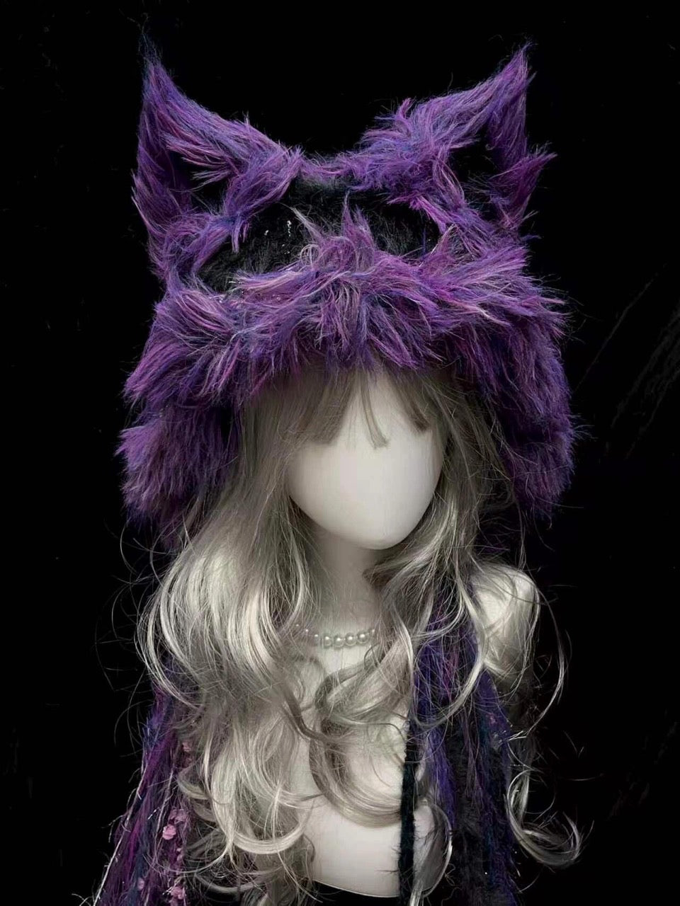 handmade crochet gothic fox ear hat in black and purple shaggy texture with floral details and long tassels, dark fairycore winter hat