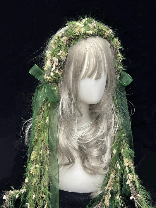 handmade crochet elf headband in green floral and vine textures, with sheer green tulle ribbon and long trailing ties, a mori girl and fairycore accessory