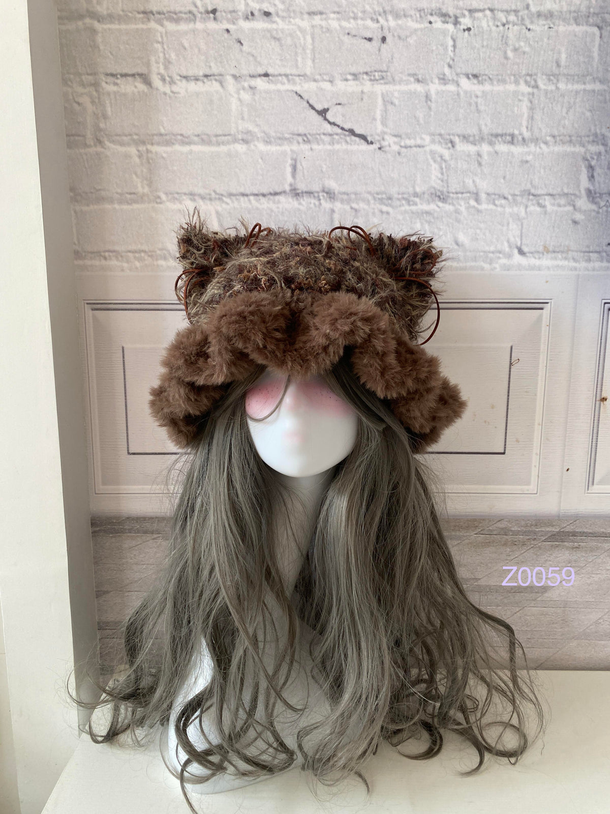 handmade crochet woodland cottagecore cat ear hat in dark brown floral fluffy texture with pointed ears and brown satin ribbon ties. Mori girl style winter headwear for cosplay, festival and photoshoot styling