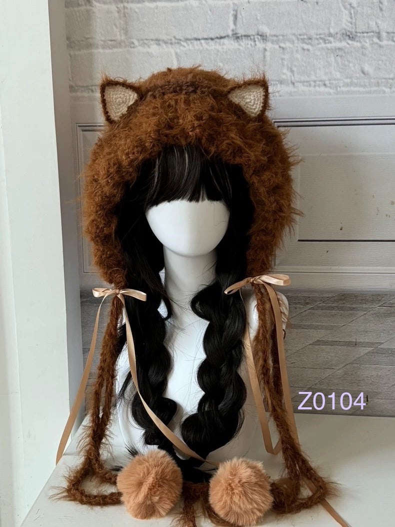 handmade crochet woodland cottagecore cat ear hood in warm brown fluffy texture, tan satin ribbon bows and soft pompom ties. Mori girl style headwear for cosplay, winter festival and photoshoot styling
