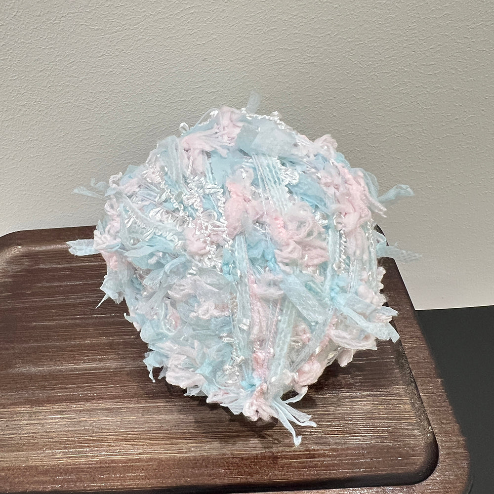 Dreamy blue pink pastel cake yarn with subtle sheer fiber, ethereal style handmade fancy yarn
