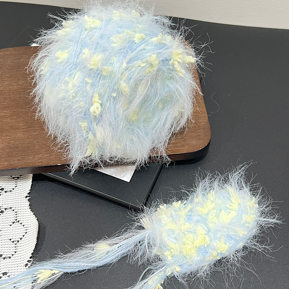shot light blue cream art yarn, unique artisan texture cake yarn