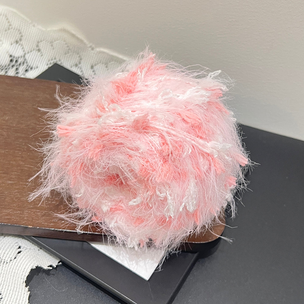 Macro tender peach pink white floral petal fiber, vegan textured yarn close up